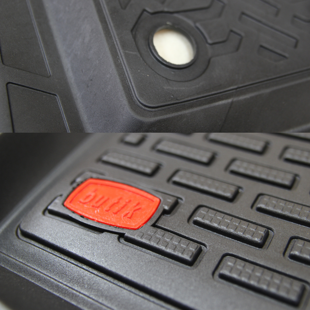 Black rubber mat with a red 'Dunlop' logo on a textured surface