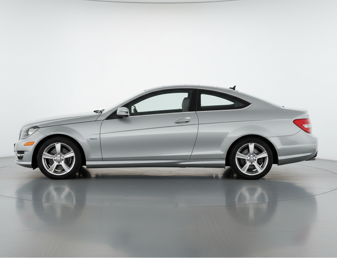 Silver Mercedes C-Class Coupé C204 on a white background