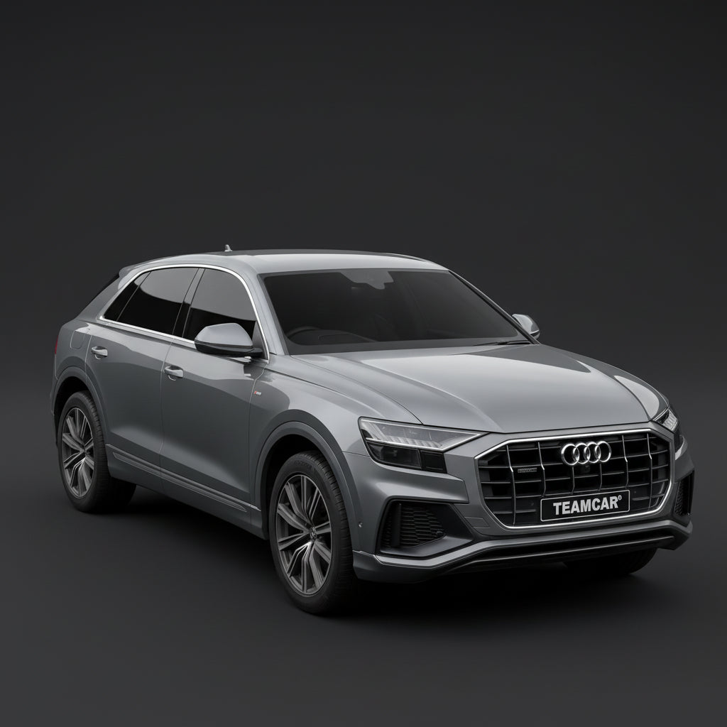Silver Audi SUV on a dark gray background