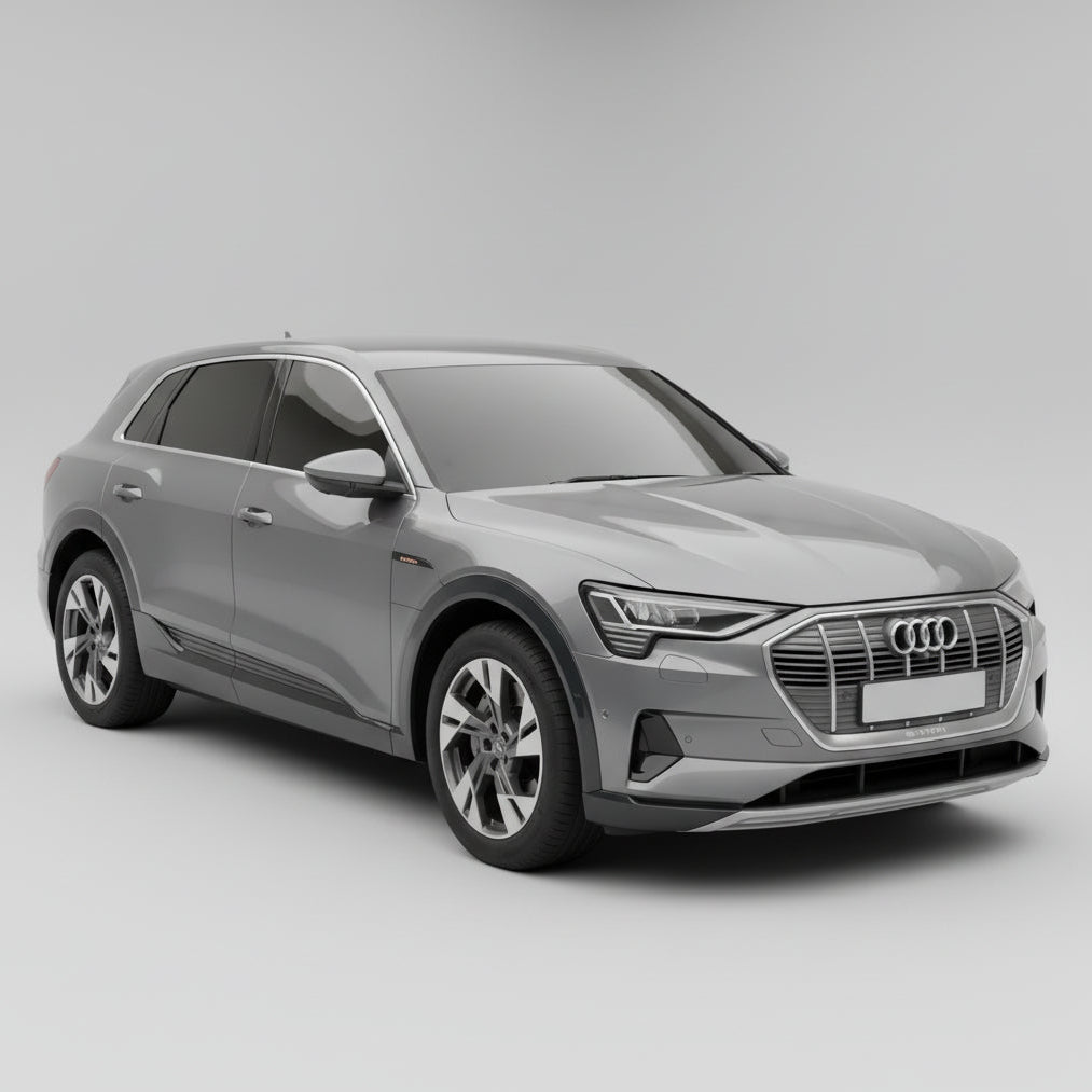 Silver Audi SUV on a gray background