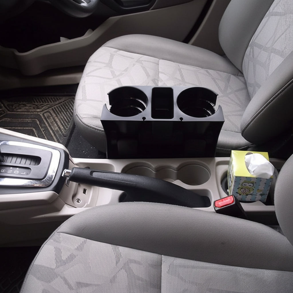 Car interior with cup holder and tissue box