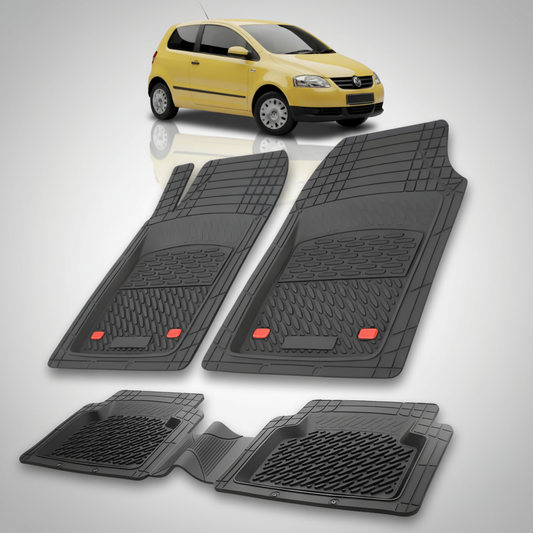 Set of black car floor mats with a yellow car in the background