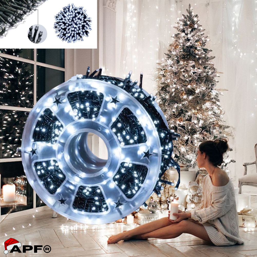 Decorative light wheel with Christmas tree and person in the background
