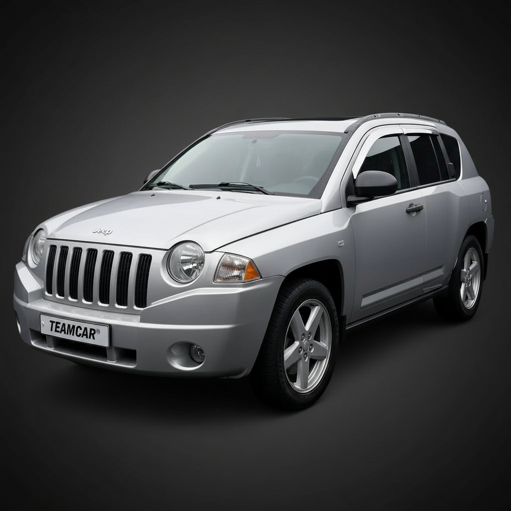 SUV Jeep Compass MK argintiu cu inscripția „Teamcar” pe fundal negru
