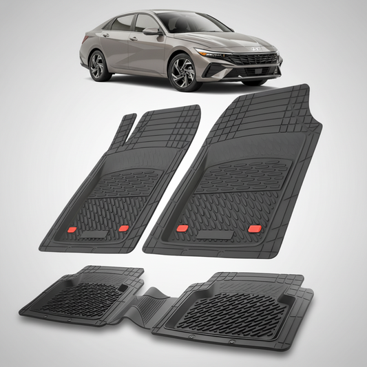 Set of black car floor mats with a car in the background