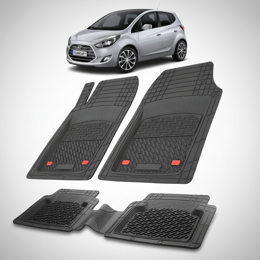 Set of black car floor mats with a silver Hyundai car in the background.