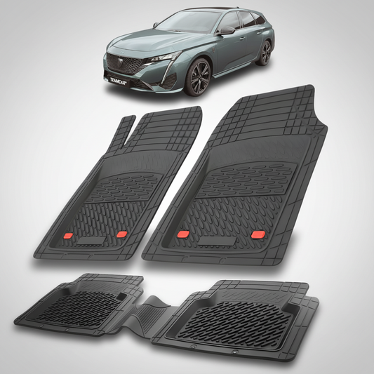 Set of black car floor mats with a car in the background