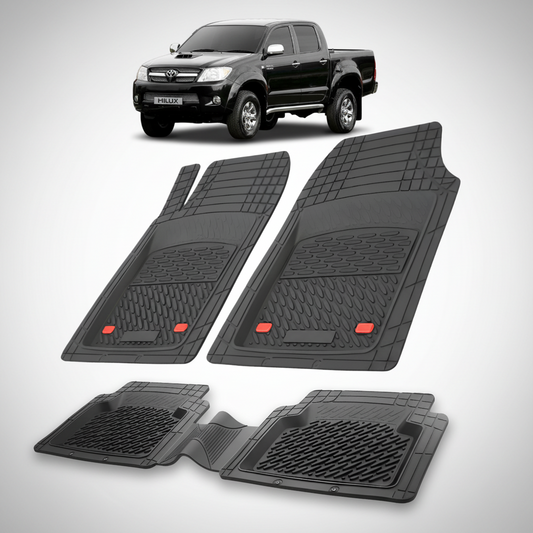 Set of black car floor mats with a Toyota Hilux in the background