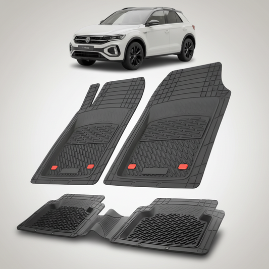 Set of black car floor mats with a white SUV in the background