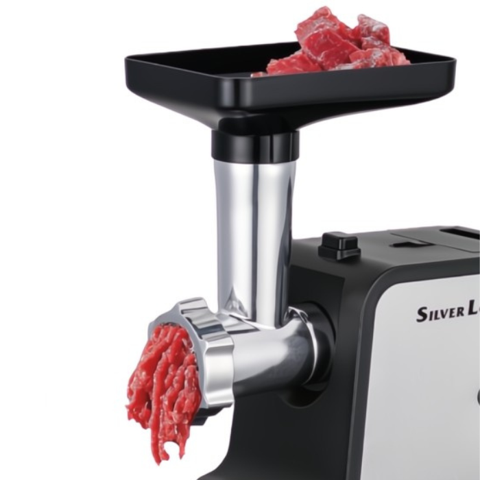 Meat grinder with ground meat output on a white background