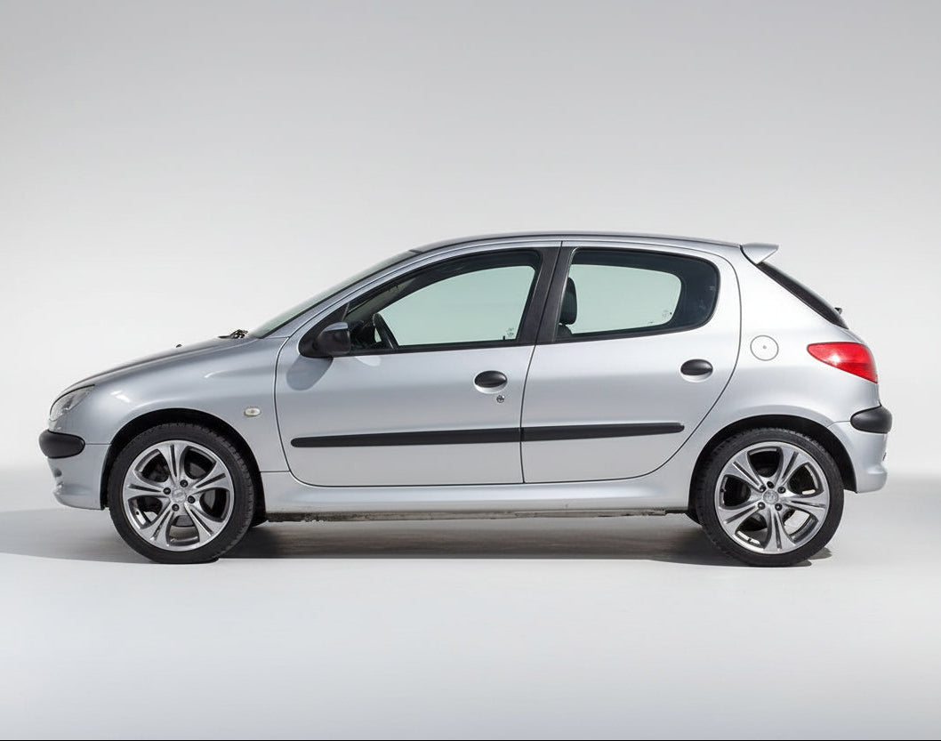 Silver Peugeot 206 (1998–2012) Hatchback  on a white background