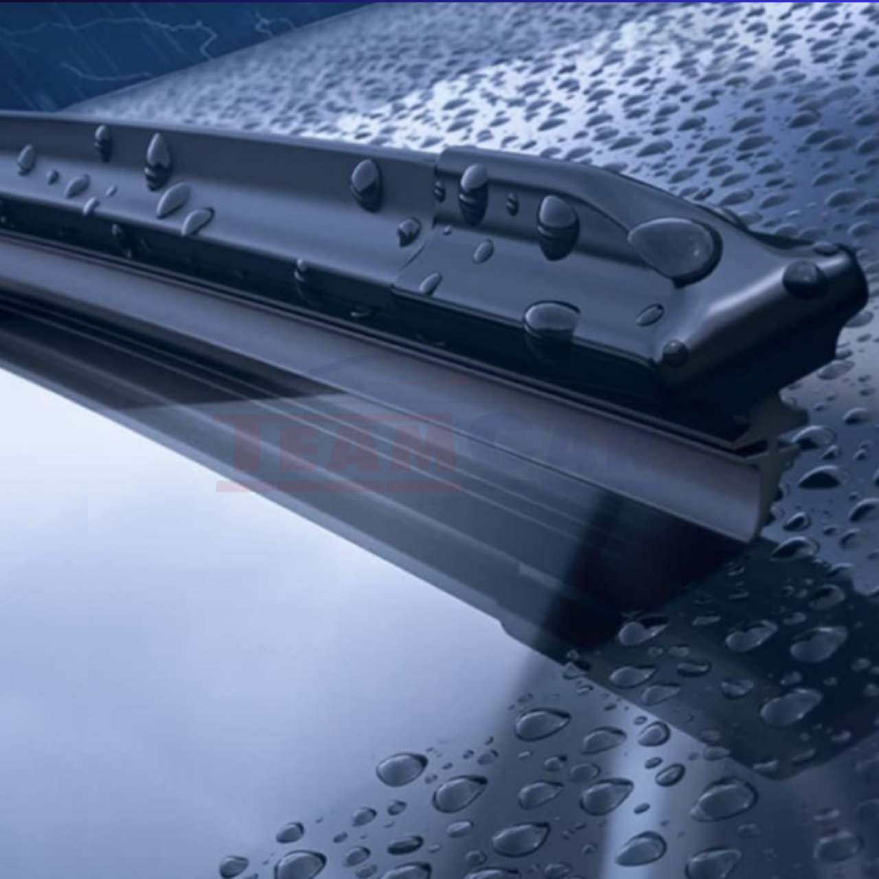 Car wiper blades on a wet surface with visible brand logo.