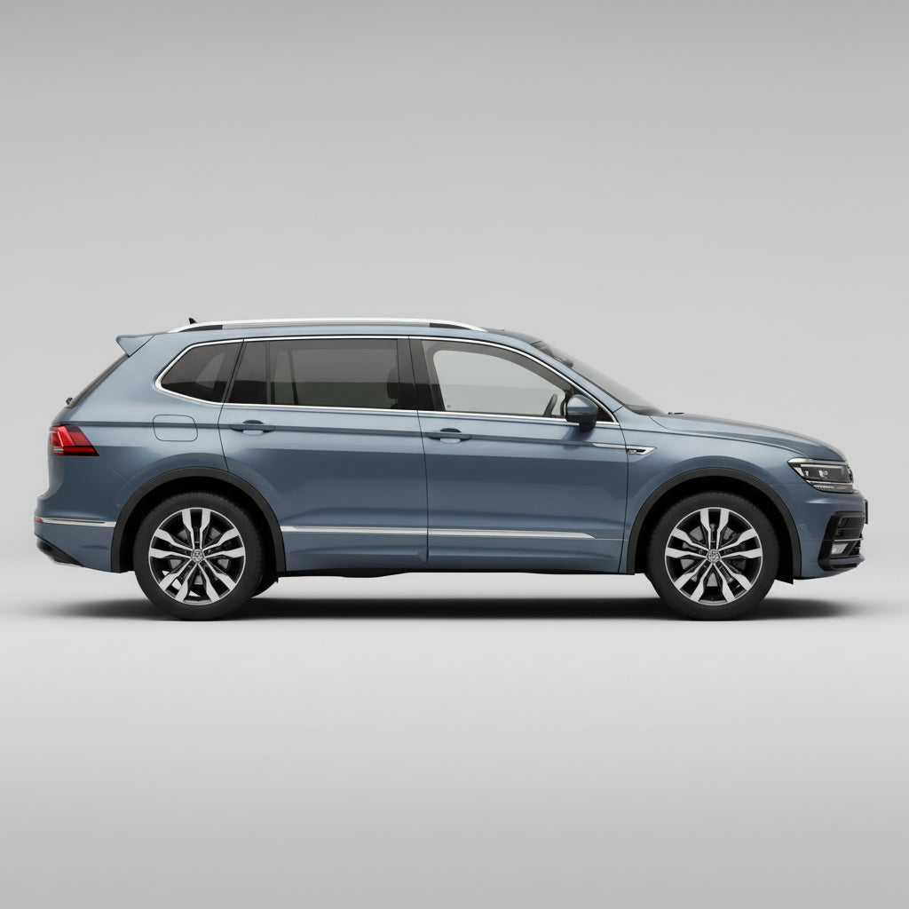 Blue Volkswagen Tiguan II (2016–2024) parked on a dirt road with mountains in the background