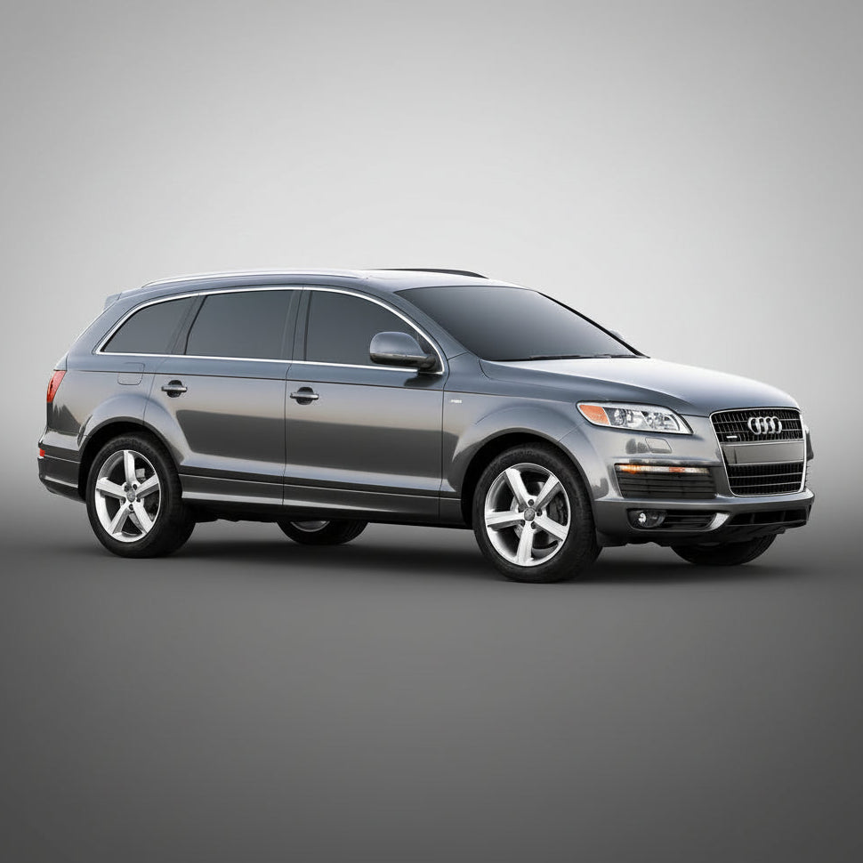 Silver Audi SUV on a gray background