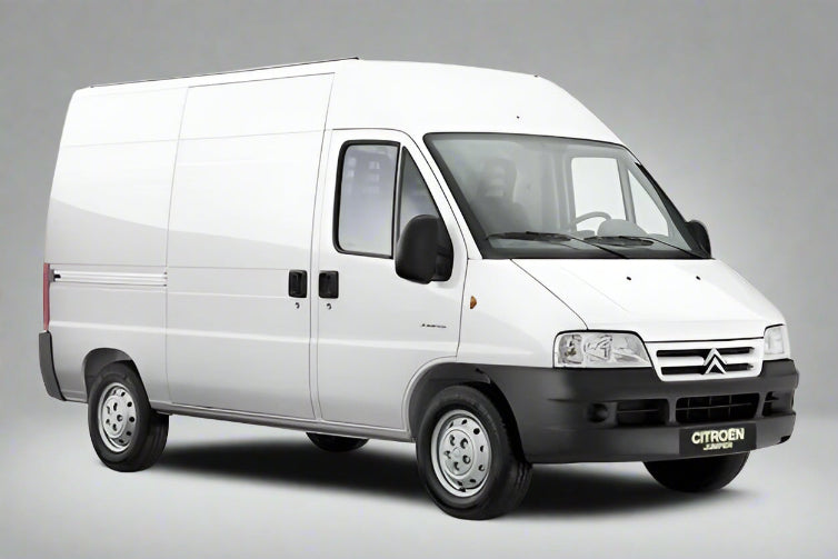 White Citroën Jumper (1994–2006) van on a grey background