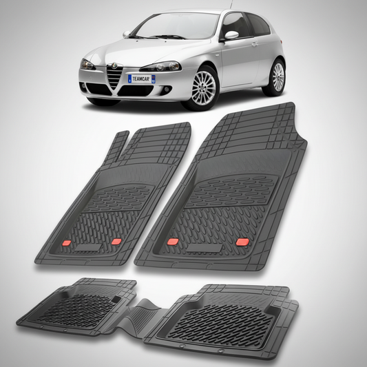 set de covorase din cauciuc negre cu o alfa romeo 147 hatchback argintiu in fundal