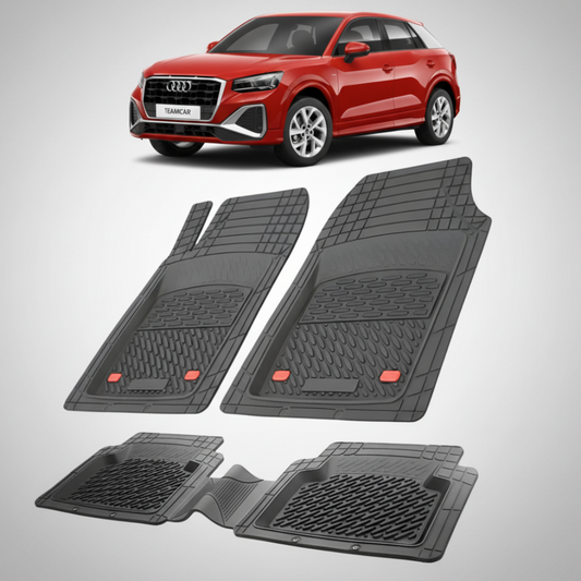 set de covorase din cauciuc negre cu un audi Q2 GA suv rosu in fundal