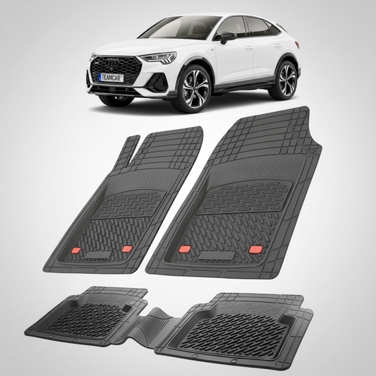 set de covorase din cauciuc negre cu un audi Q3 sportback f3 suv coupe alb in fundal