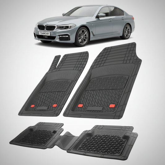 Set of black car floor mats with a silver car in the background