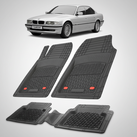 Set of black car mats with a white car in the background