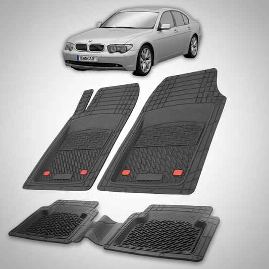 Set of black car mats with a white car in the background
