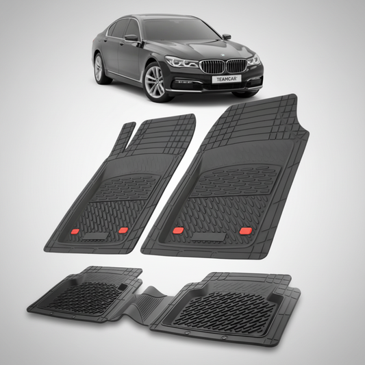 Set of black car floor mats with a BMW car in the background
