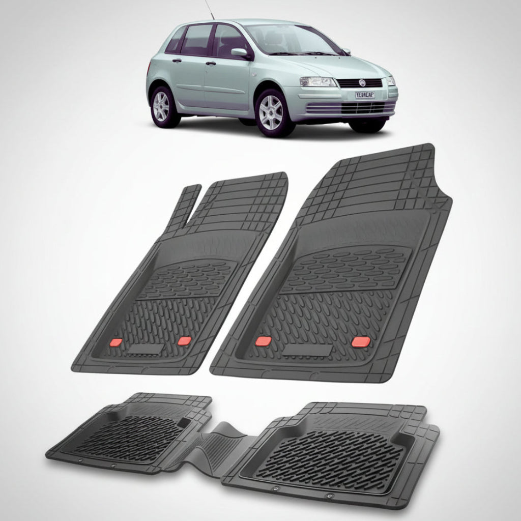 set de covorase din cauciuc negre cu un fiat stilo hatchback 5 usi gri in fundal