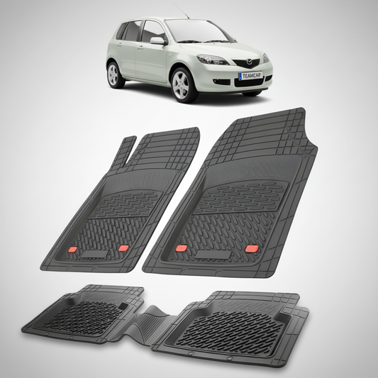 set de covorase din cauciuc negre cu o mazda 2 generatia i argintie in fundal