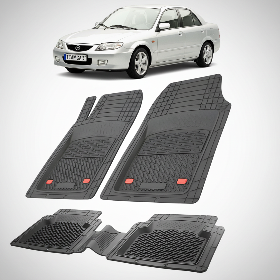 set de covorase din cauciuc negre cu o mazda 323 bj facelift sedan argintie in fundal