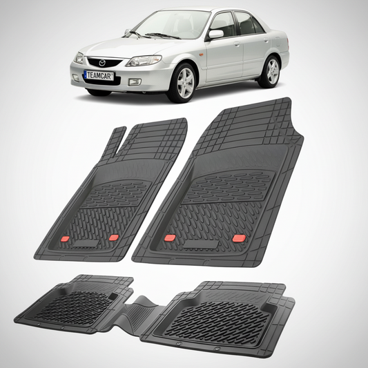 set de covorase din cauciuc negre cu o mazda 323 bj facelift sedan argintie in fundal