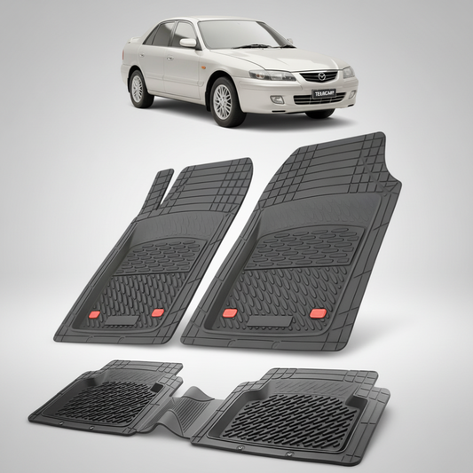 set de covorase din cauciuc negre cu o mazda 626 GF facelift sedan argintie-metalizat in fundal