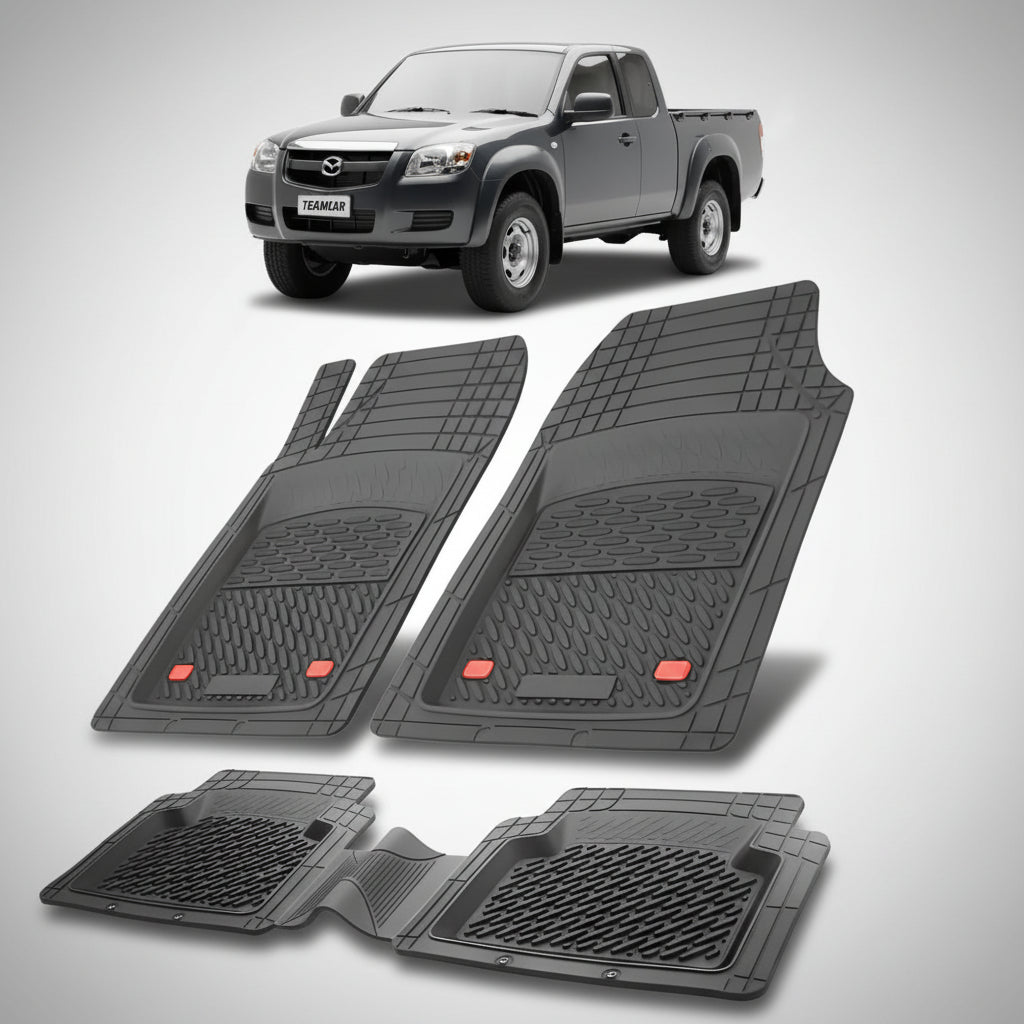 set de covorase din cauciuc negre cu o mazda tb-50 j97 pick-up gri inchis metalizat in fundal