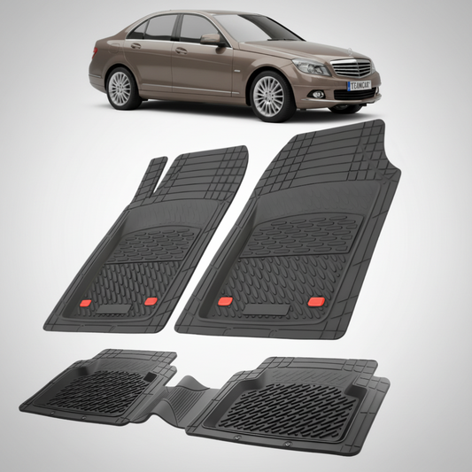 Set of black car floor mats with a car in the background