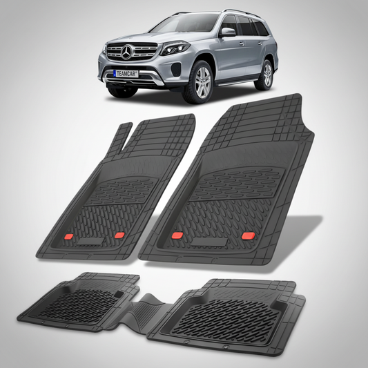 Set of black car floor mats with a Mercedes-Benz SUV in the background.