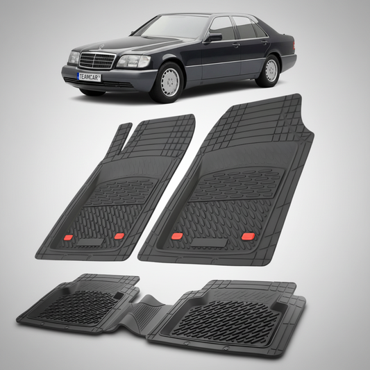 Set of black car floor mats with a Mercedes-Benz car in the background.