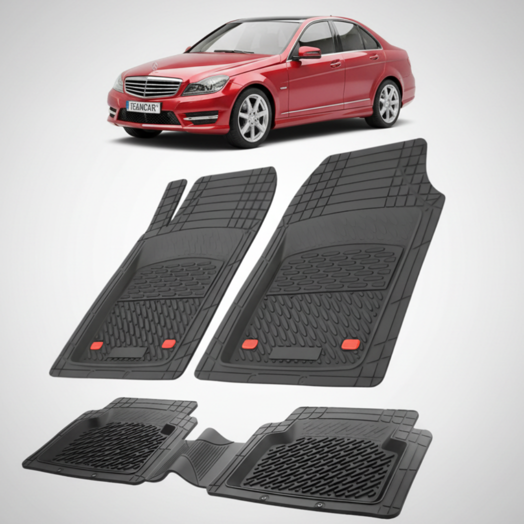 Set of black car floor mats with a red car in the background