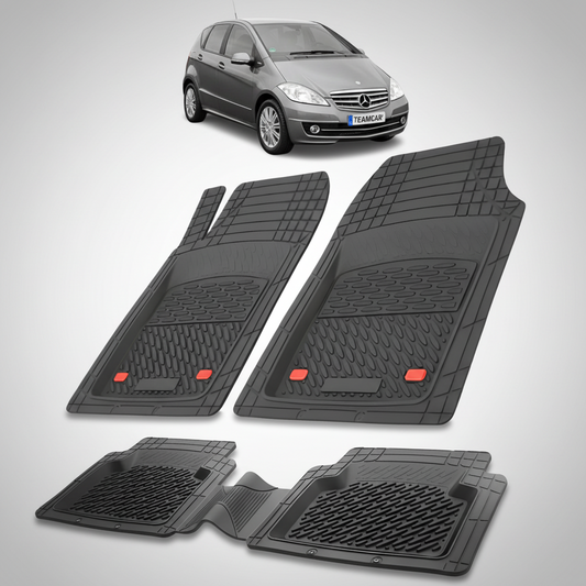 Set of black car floor mats with a Mercedes-Benz car in the background.