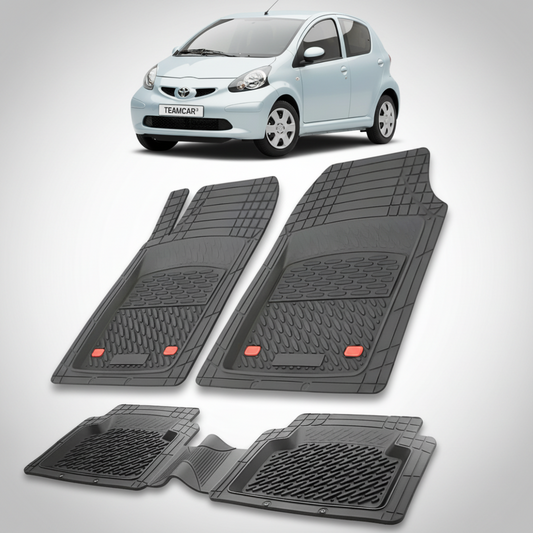 set de covorase din cauciuc negre cu o toyota aygo ab10 hatchback gri in fundal