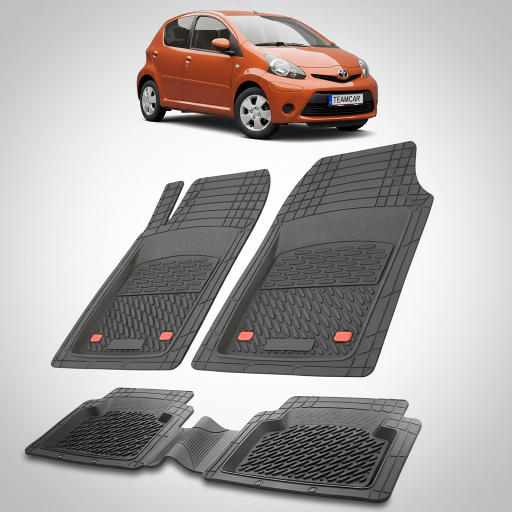 set de covorase din cauciuc negre cu o toyota aygo ab10 hatchback portocalie in fundal