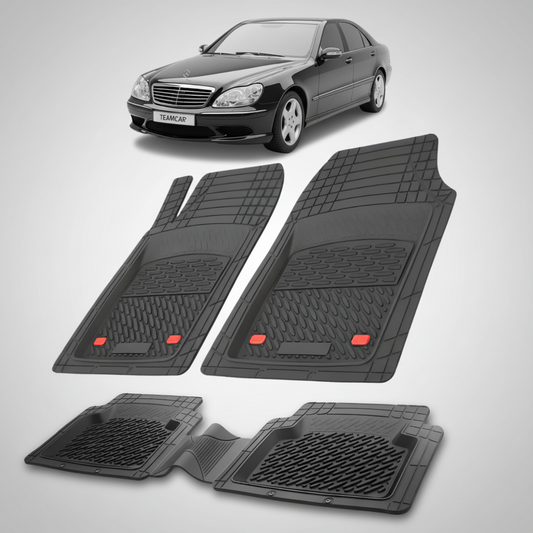 Set of black car floor mats with a Mercedes-Benz car in the background.