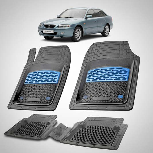 set de covorase din cauciuc negre cu accente albastre cu o mazda 626 GF Facelift Hatchback 5 usi albastru-verzui in fundal