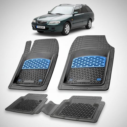 set de covorase din cauciuc negre cu accente albastre cu o mazda 626 GW Facelift combi verde-inchis in fundal