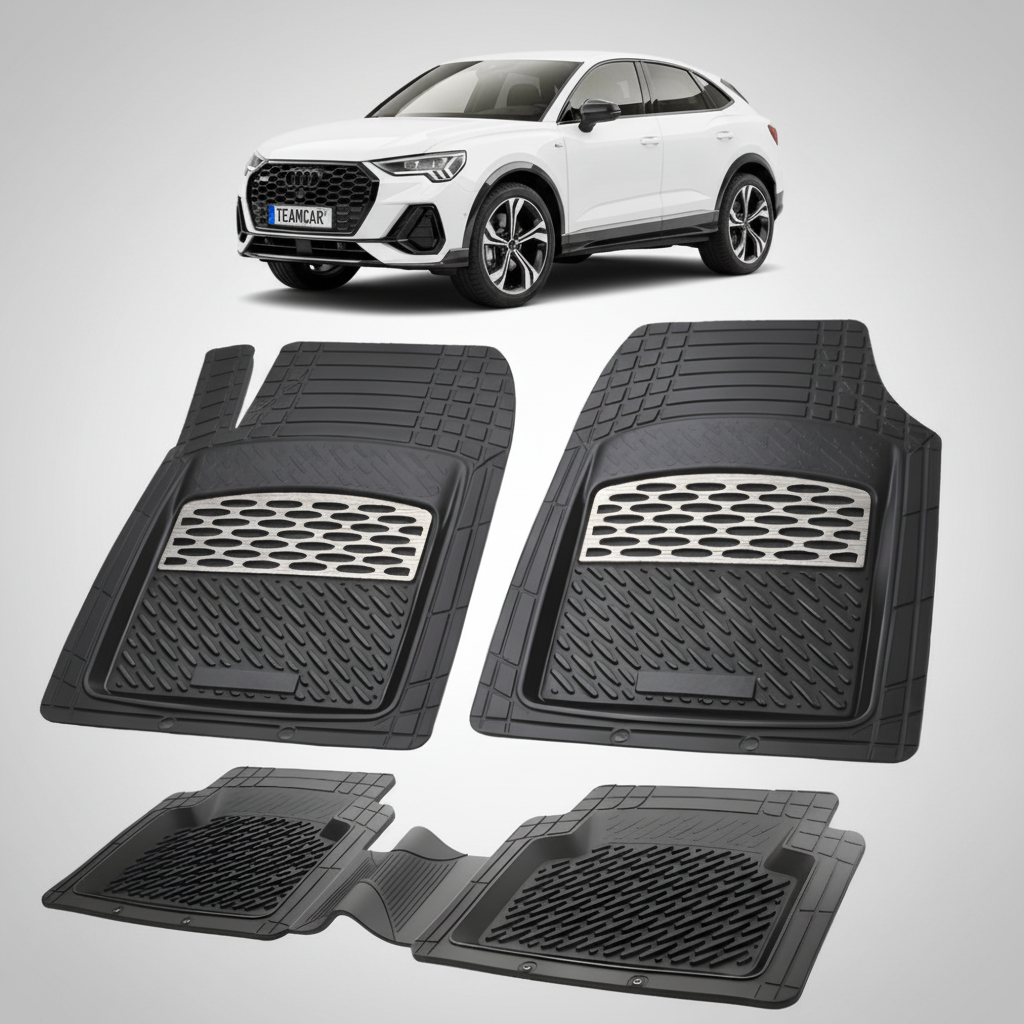 Fekete gumiszőnyegek szürke díszítéssel, a háttérben egy fehér Audi Q3 Sportback F3 SUV kupéval