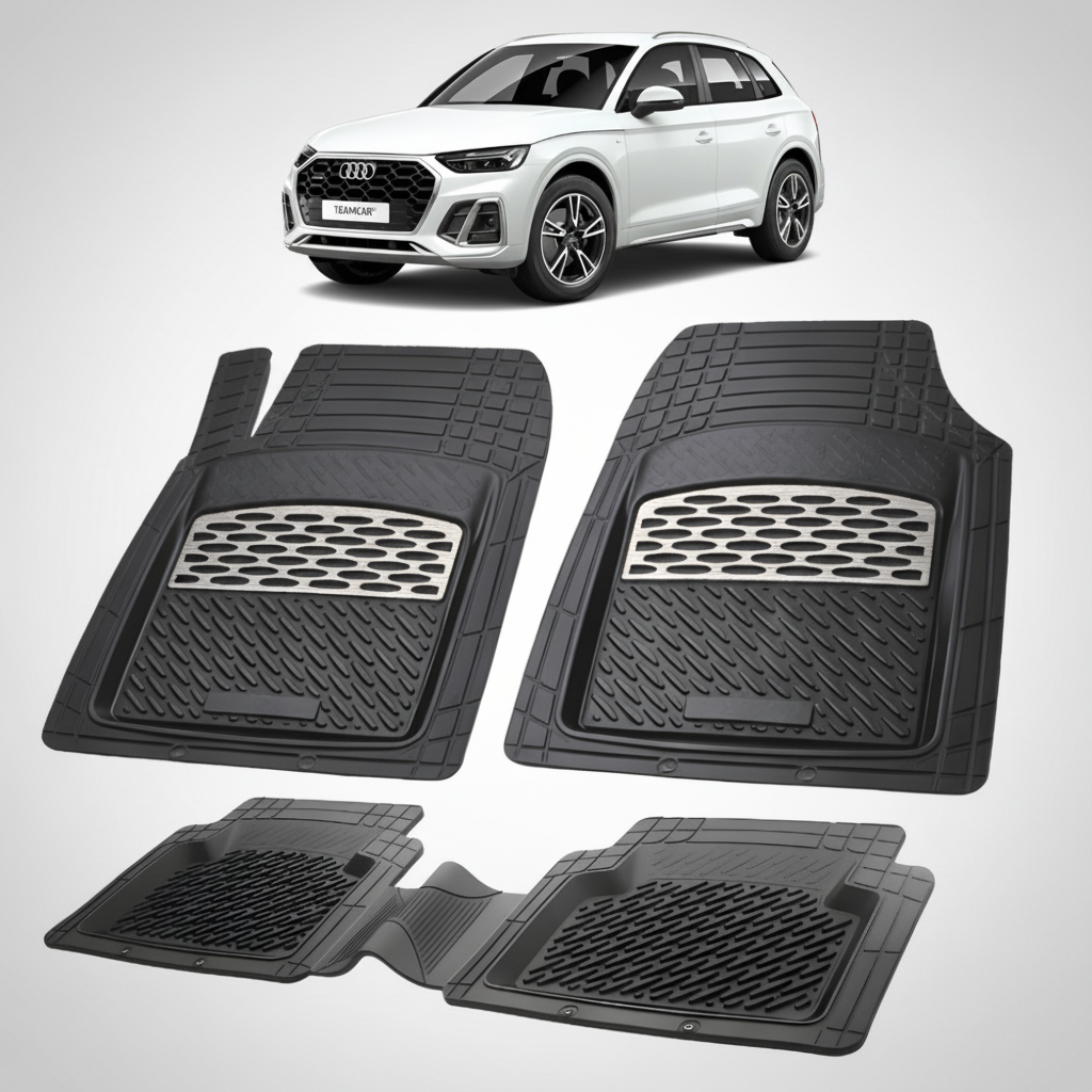 Fekete gumiszőnyegek szürke díszítéssel, a háttérben egy fehér Audi Q5 Sportback FY SUV Coupéval