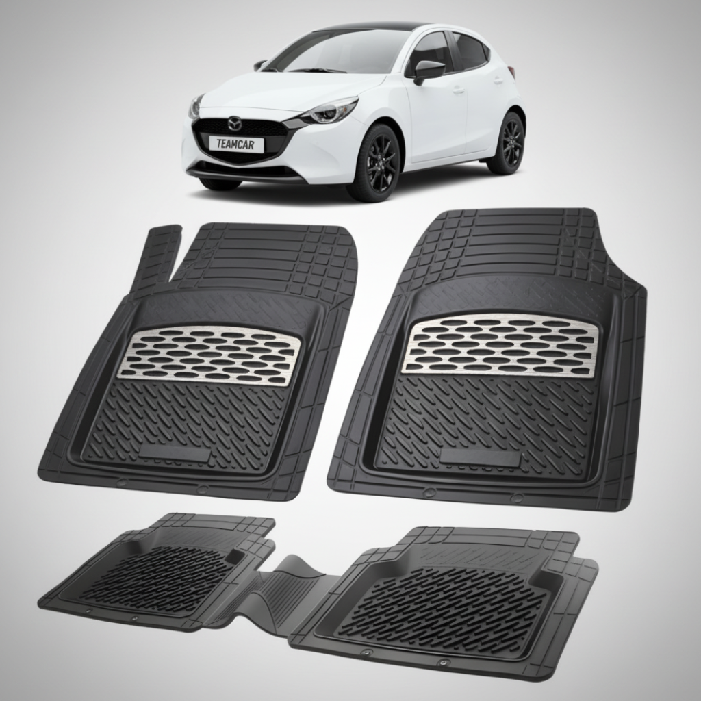 set de covorase din cauciuc negre cu accente gri cu o mazda 2 hybrid xp210 hatchback 5 usi alba  in fundal
