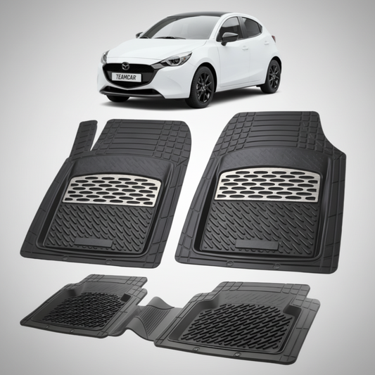 set de covorase din cauciuc negre cu accente gri cu o mazda 2 hybrid xp210 hatchback 5 usi alba  in fundal