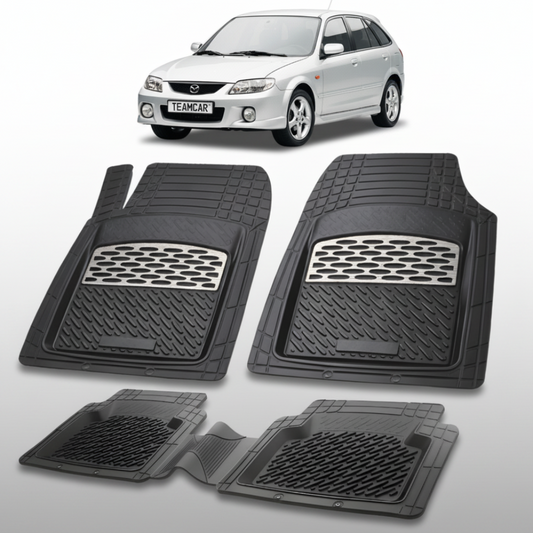 set de covorase din cauciuc negre cu accente gri cu o mazda 323 bj facelift hatchback 5 usi argintie in fundal