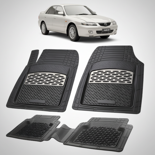 set de covorase din cauciuc negre cu accente gri cu o mazda 626 GF Facelift sedan argintie-metalizat in fundal
