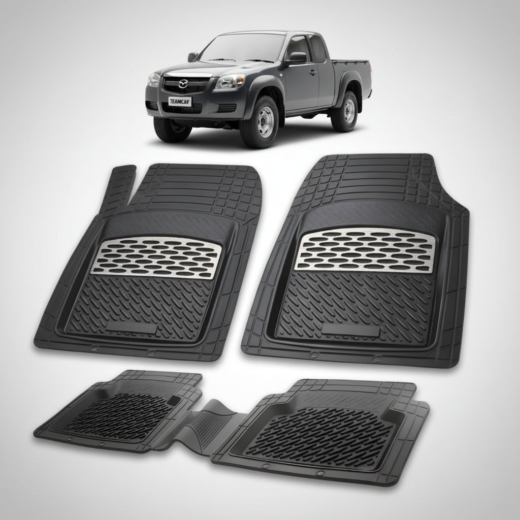 set de covorase din cauciuc negre cu accente gri cu o mazda tb-50 j97 pick-up gri inchis metalizat in fundal