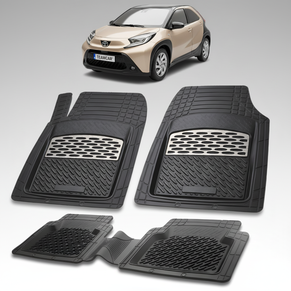 set de covorase din cauciuc negre cu accente gri cu o toyota aygo ab70 crossover maro  in fundal